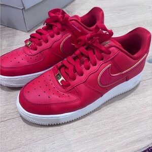 Red nike Air Force 1s Sneakers